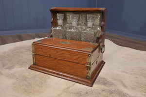 English Oak Tantalus dated 1884