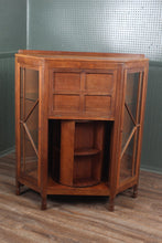 Load image into Gallery viewer, English Oak Arts and Crafts Revolving Bookcase Cabinet attributed to Crittermen c.1910