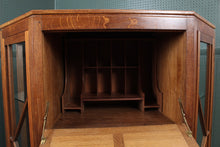Load image into Gallery viewer, English Oak Arts and Crafts Revolving Bookcase Cabinet attributed to Crittermen c.1910