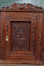 Load image into Gallery viewer, Petite English Carved Oak Hanging Corner Cabinet c.1890